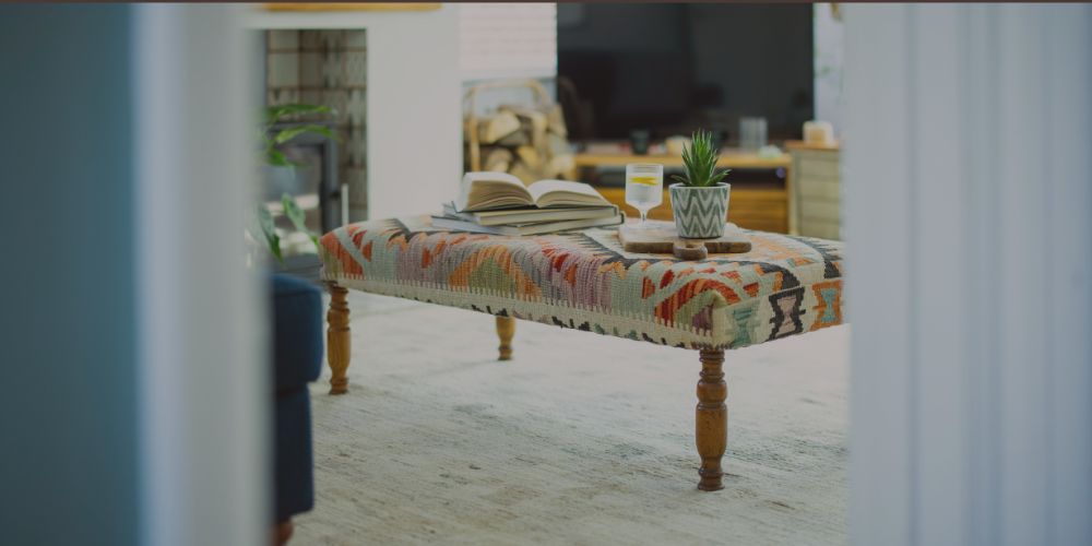 Handmade rug and Kilim upholstered bench bringing traditional craftsmanship into a contemporary living space.